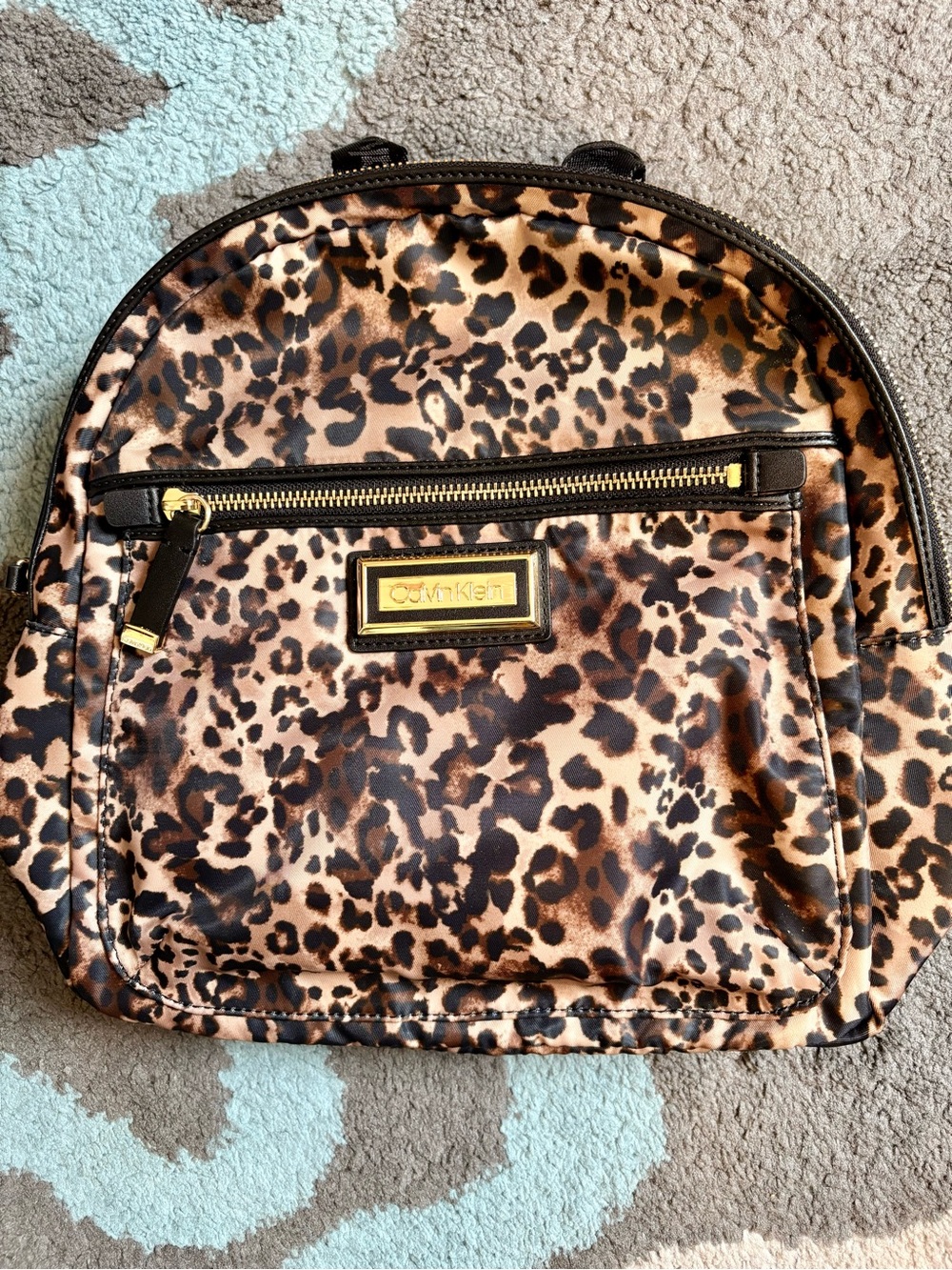 Calvin Klein Leopard-Print Mini Backpack in Brown and Black